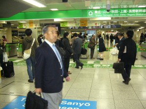 The people rushing around Tokyo station on Friday night.